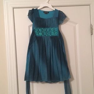 Sparkly aqua blue dress with lace designed belt.